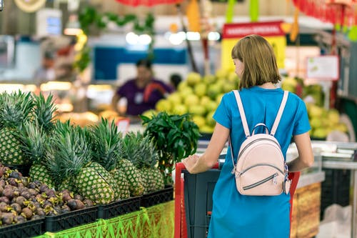 Young woman in supermarket